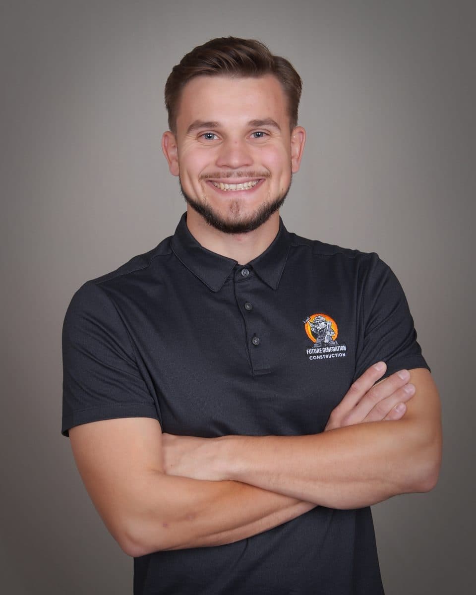 Paul, owner and project manager at Future Generation Construction, in a branded company shirt at the Sacramento office